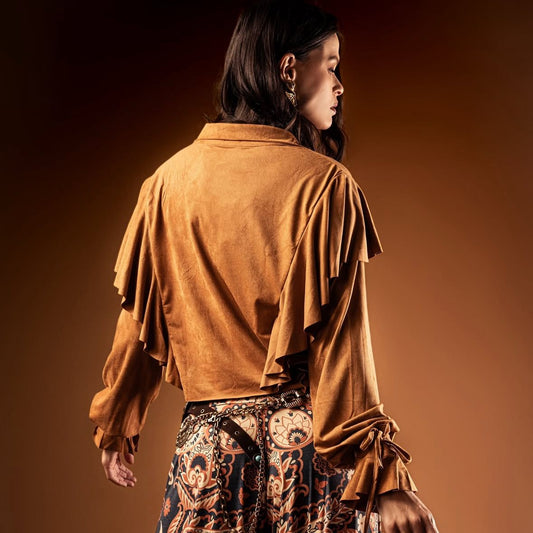 Blusa Terracota Luxe Impulsa Boutique, vista trasera completa, caída amplia, detalle elegante de volantes.